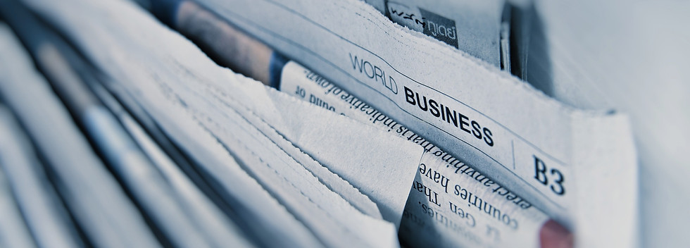 Business newspaper pages_edited.jpg